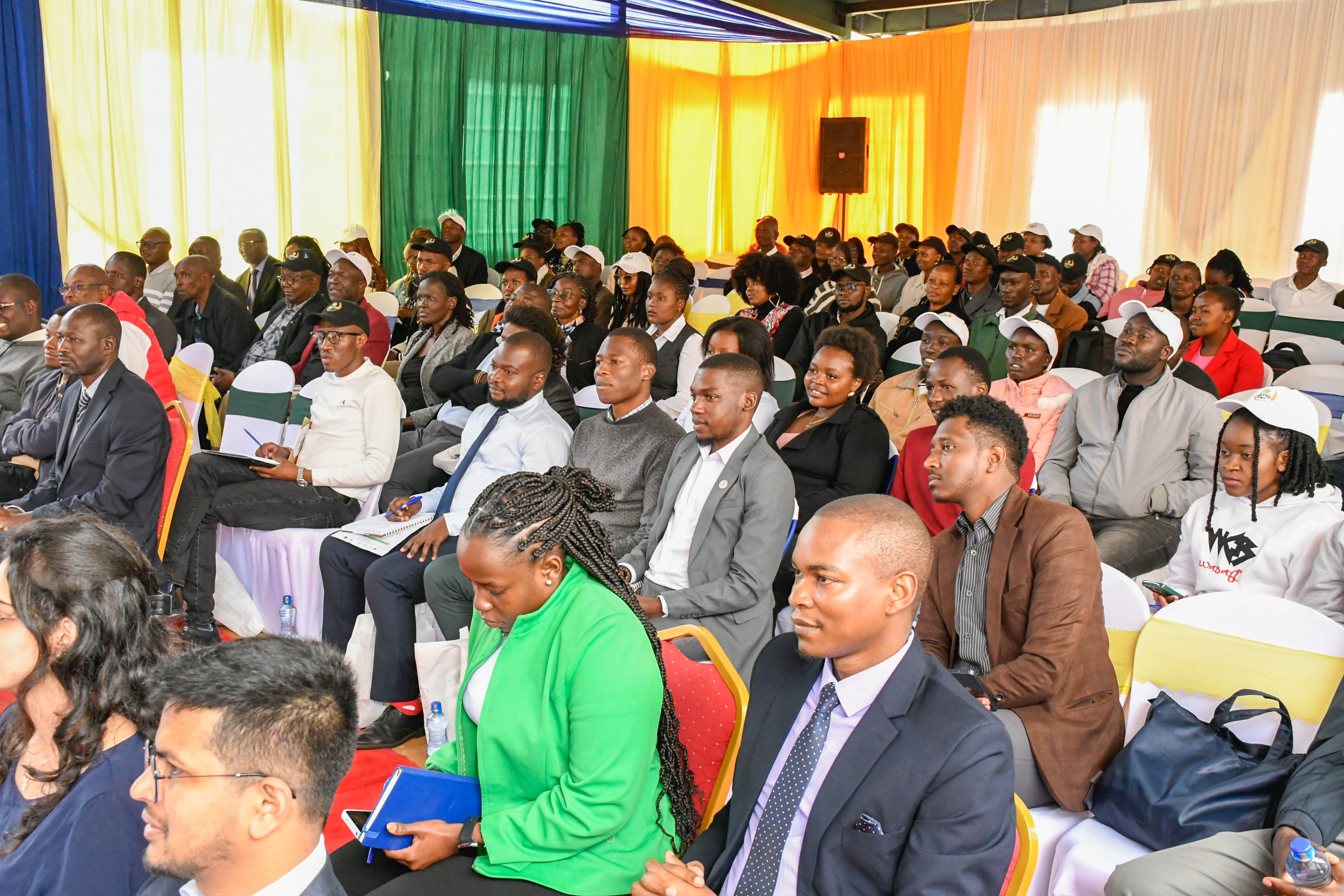 Participants follow deliberations at the workshop