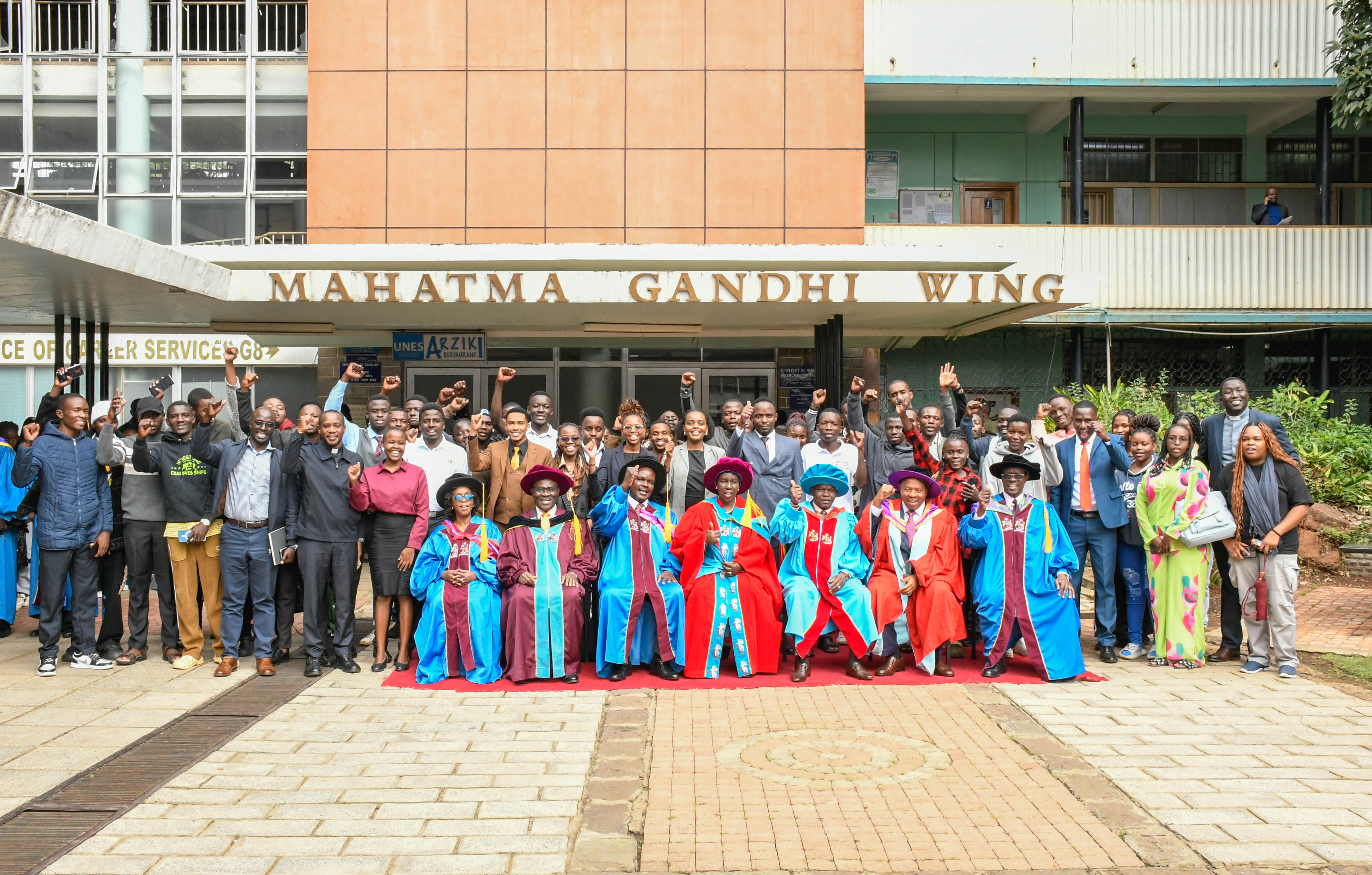 Excited First Years express their excitement with the University Management